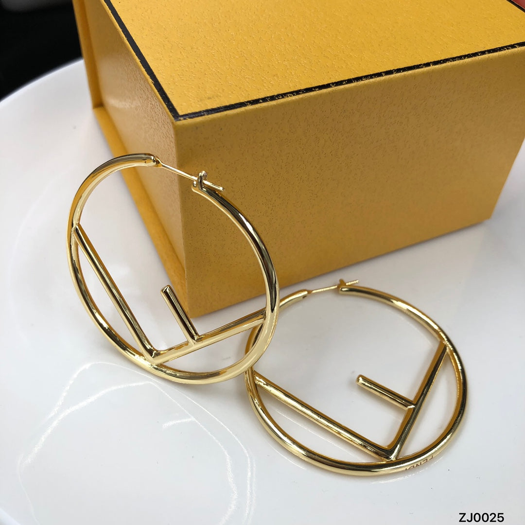 F gold earrings
