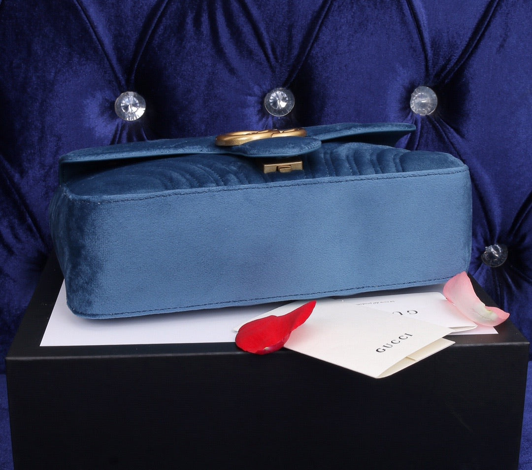 velvet blue handbag