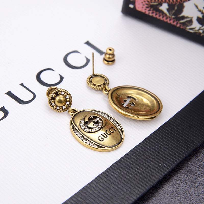 G u c c I earrings