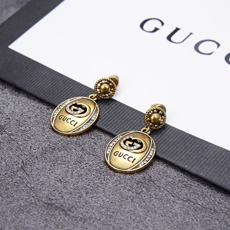 G u c c I earrings