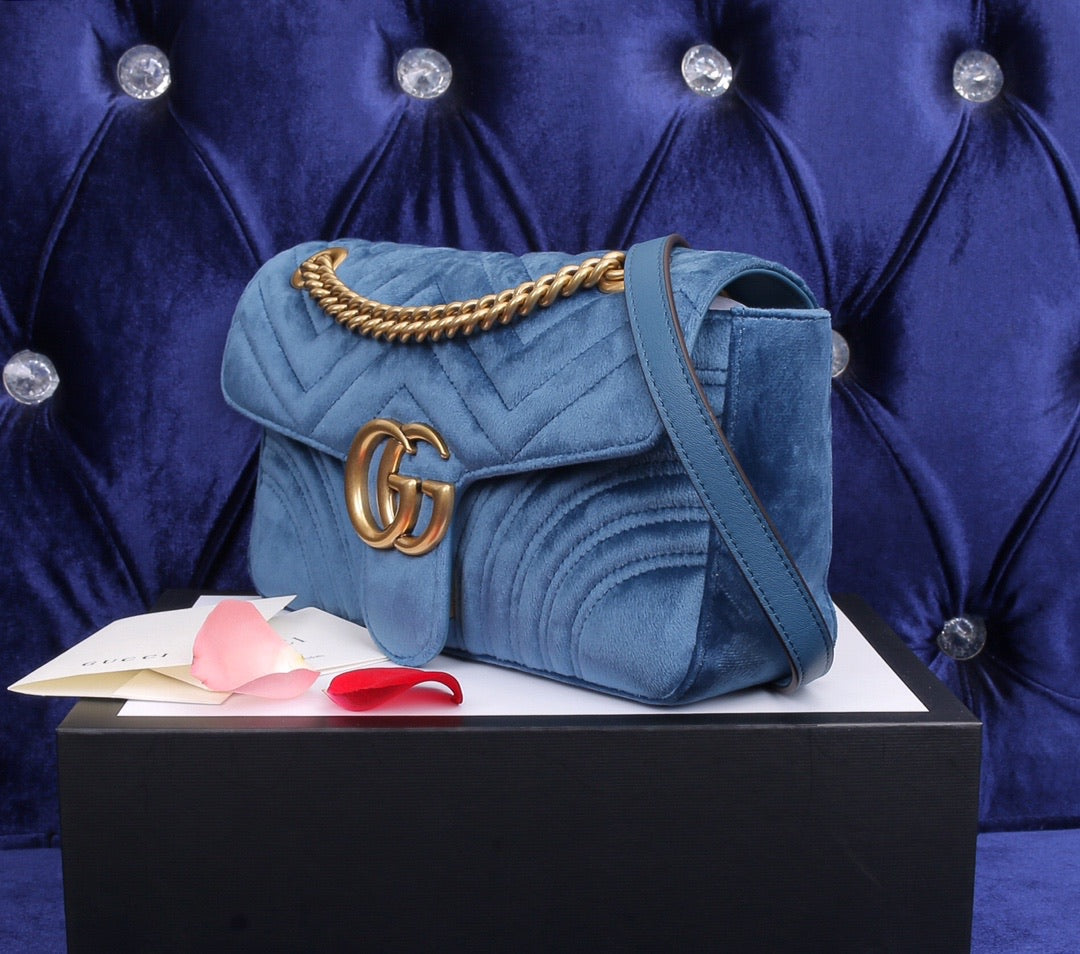 velvet blue handbag