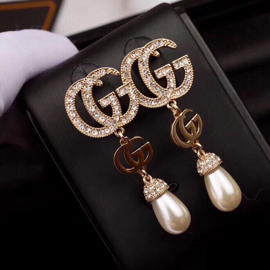 G u c c I earrings