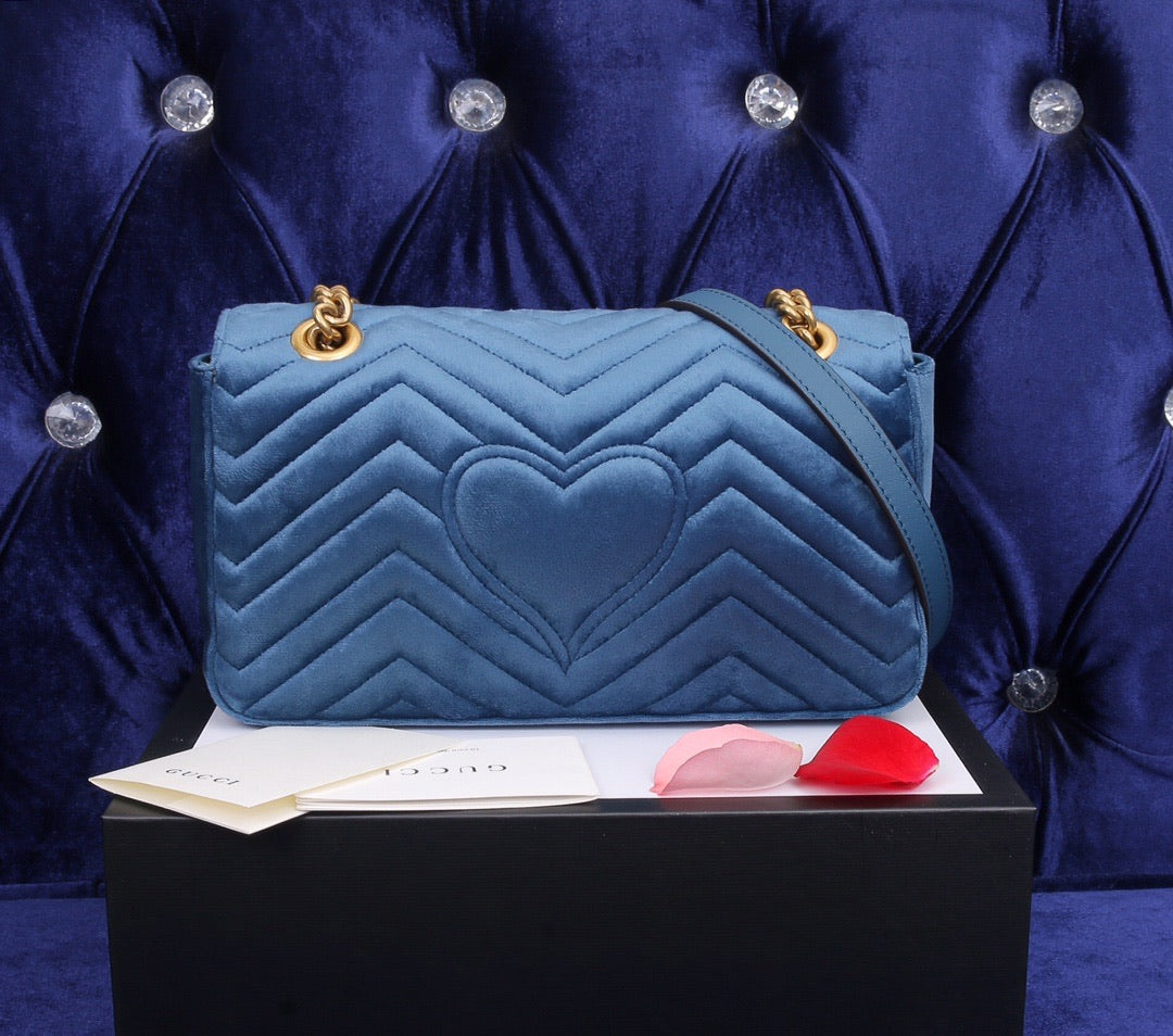 velvet blue handbag