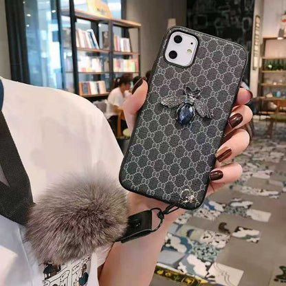 Rhinestone bee hair ball lanyard phone case
