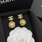 Gold pearl earrings