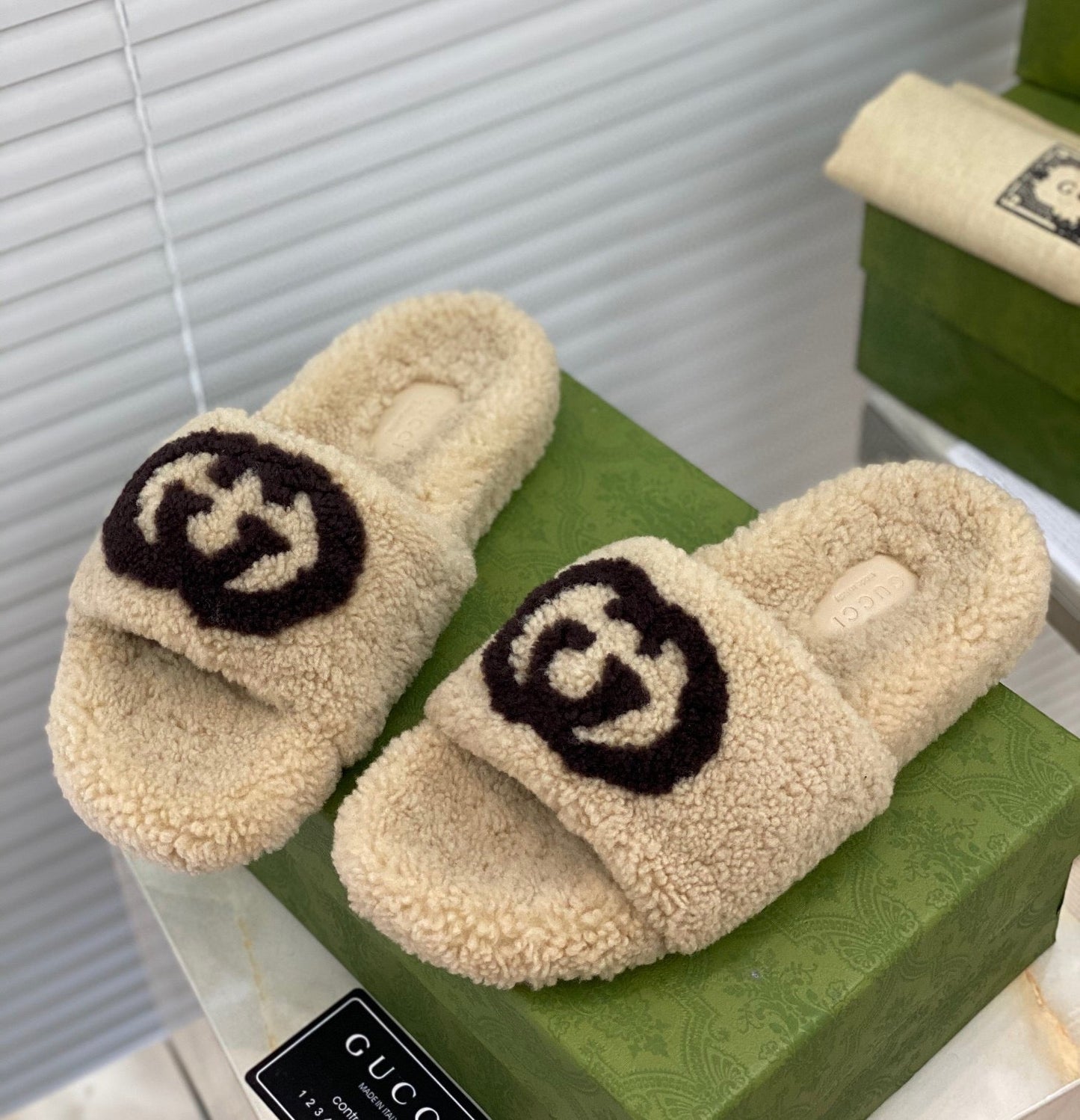 G u c c I slippers
