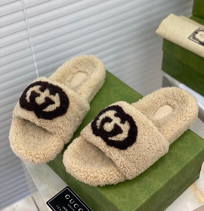 G u c c I slippers