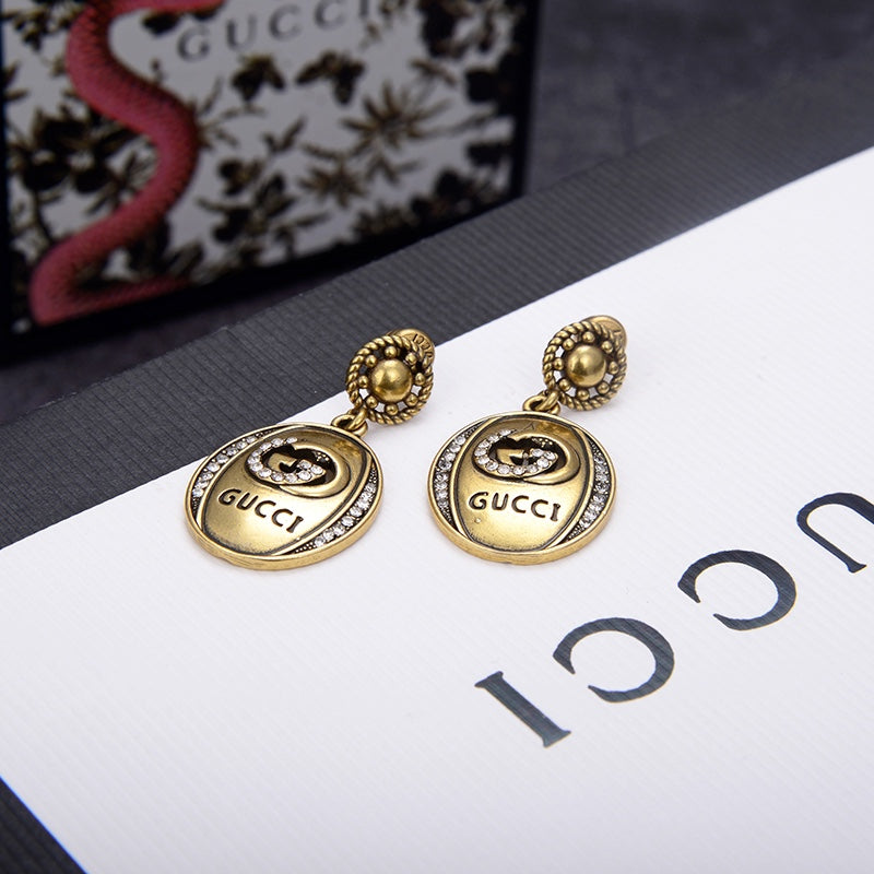 G u c c I earrings