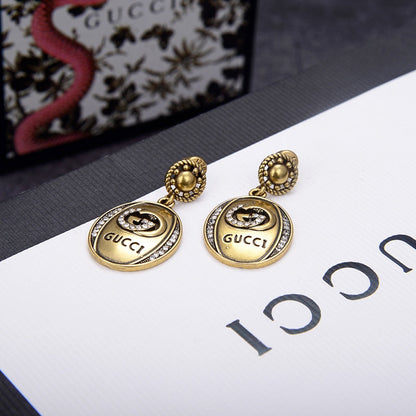 G u c c I earrings