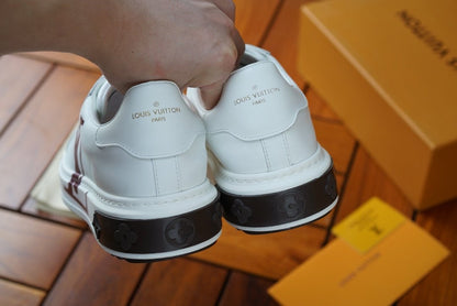 L V - T E E - L O G O - S N E A K E R S