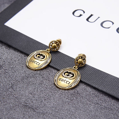 G u c c I earrings