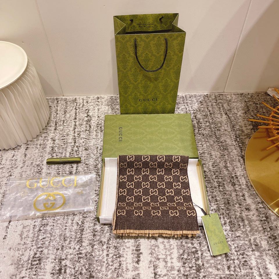 G u c c i scarf brown