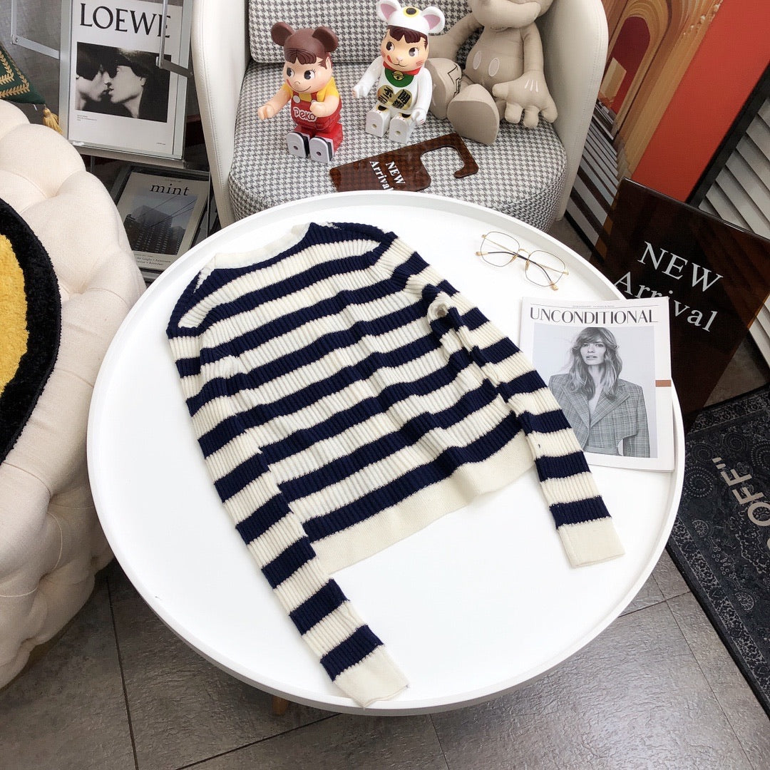 Black-and-white striped jumper