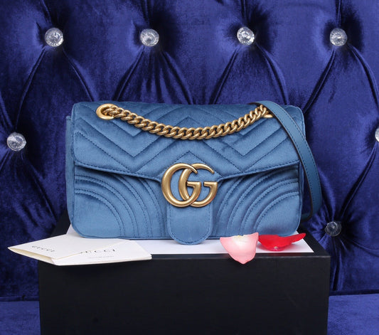 velvet blue handbag