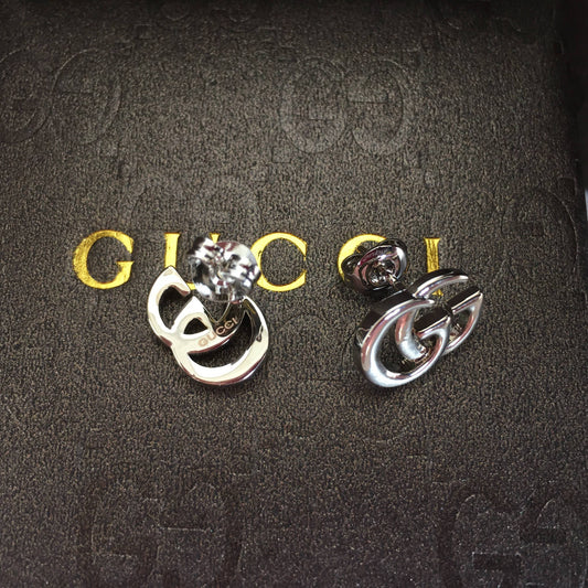 G u c c I earrings