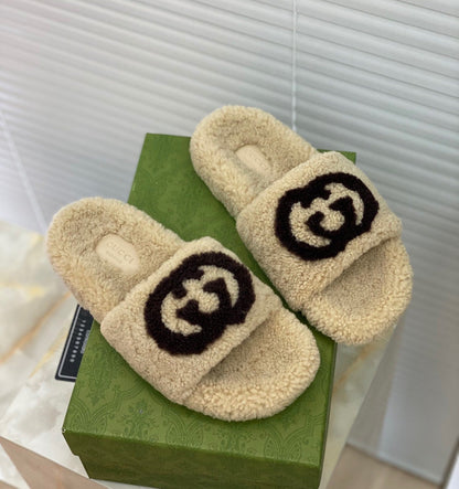 G u c c I slippers